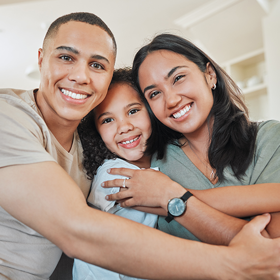 Family outside a Tucson home